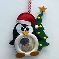 Christmas Photo Frame. Penguin with Tree Design.